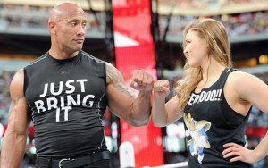 When it should clearly be "Ronda Rousey helping The Rock punch an invisible man".
